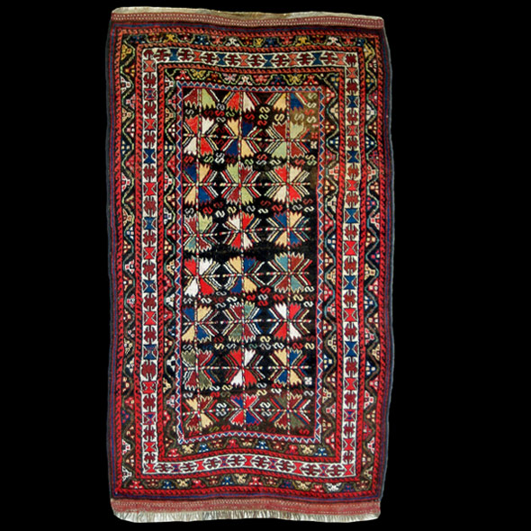 Semi-antique Iraqi Hereki Kurd hearth rug,